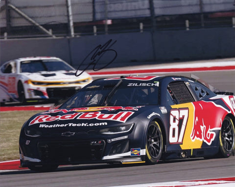 Autographed 2025 Connor Zilisch #87 Red Bull Racing Watkins Glen photo showing the rookie Cup Series driver’s vibrant Red Bull car in action with his clear signature across the glossy surface. A collectible piece that makes a great gift. We are always here to help with any questions.