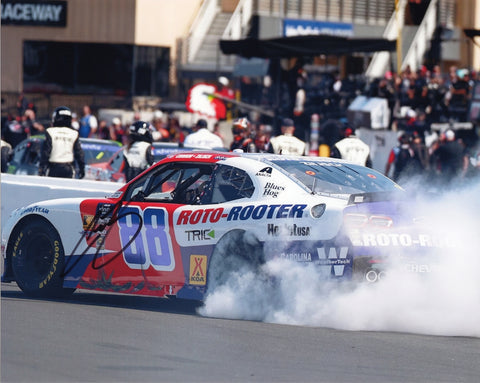 Autographed 8x10 photo of Connor Zilisch performing his 2025 Sonoma race win burnout in the #88 Roto-Rooter Racing car. His signature adds collectible value, and the image captures smoke, celebration, and victory energy. It makes a great gift, and we are always here to help with any questions.