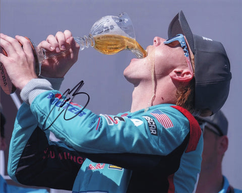 Autographed 8x10 photo of Connor Zilisch celebrating his 2025 Sonoma Victory Lane win in the #88 Roto-Rooter Racing car. The bold signature enhances its collectible appeal, and the image captures the excitement of a major career highlight. It makes a great gift, and we are always here to help with any questions.