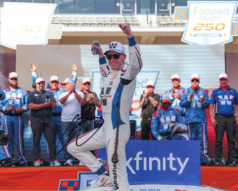 Autographed 8x10 photo of Connor Zilisch celebrating his 2025 COTA race win in the #88 WeatherTech Racing car. His signature is clearly visible, and the image captures the energy of the Victory Celebration. It makes a great gift for NASCAR fans, and we are always here to help with any questions.