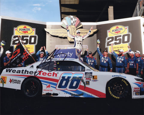 Autographed 8x10 photo of Connor Zilisch celebrating his 2025 Indy Race Win in Victory Lane with the #88 WeatherTech Racing team. His signature enhances its collectible appeal, and the scene captures a defining moment in his rising NASCAR career. It makes a great gift, and we are always here to help with any questions.