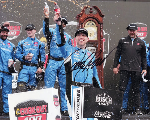 Autographed 8x10 photo of Denny Hamlin celebrating his 2025 Martinsville win with the famous Grandfather Clock trophy beside the Progressive No. 11 team backdrop. A meaningful collectible for NASCAR fans and makes a great gift. We are always here to help with any questions.