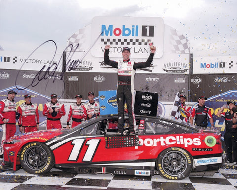 Autographed 8x10 photo of Denny Hamlin standing beside his Sport Clips Racing #11 Toyota in Darlington Victory Lane after the 2025 win. The image shows celebratory details and Hamlin’s signature, making it a great gift for collectors. We are always here to help with any questions.