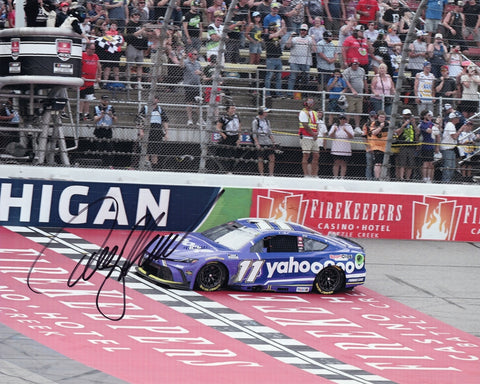 Autographed 8x10 NASCAR photo of Denny Hamlin holding the checkered flag after winning at Michigan in the 2025 Yahoo Racing #11 Toyota. The image highlights the victory moment, Hamlin’s signature, and the vibrant race-day atmosphere. It makes a great gift for fans, and we are always here to help with any questions.