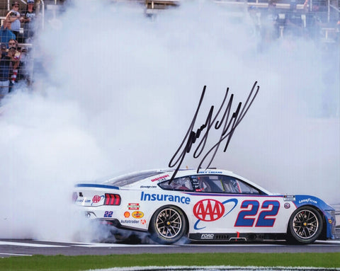 Autographed 8x10 NASCAR photo of Joey Logano performing a smoky victory burnout in the #22 AAA Racing Ford after his 2025 Texas win. The signed image is ideal for collectors and makes a great gift for racing fans, and we are always here to help with any questions.