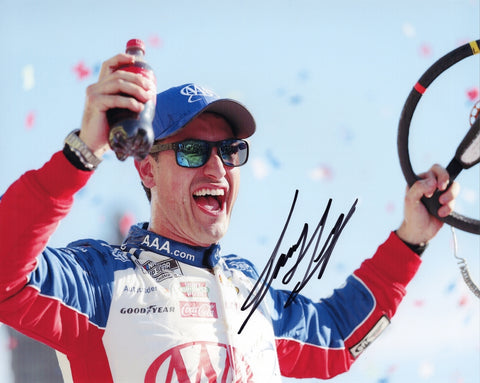 Autographed 8x10 photo of Joey Logano celebrating his 2025 Texas win with the #22 AAA Racing Ford in victory lane. The signed image is perfect for NASCAR collectors and makes a great gift, and we are always here to help with any questions.