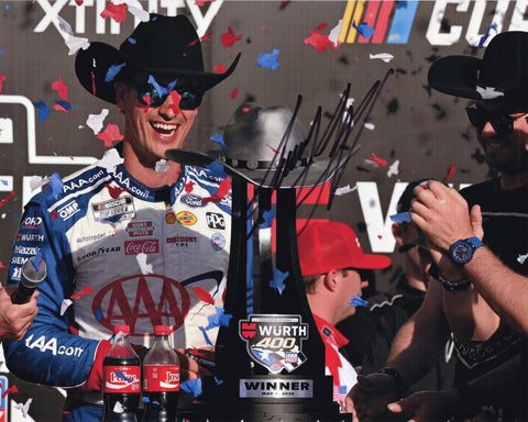 Autographed 8x10 photo of Joey Logano celebrating his 2025 Texas win in victory lane while holding the trophy beside the #22 AAA Racing Ford. A bold NASCAR collectible that makes a great gift for fans, and we are always here to help with any questions.