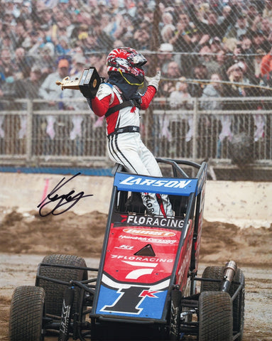Autographed 8x10 photo of Kyle Larson celebrating his 2025 Chili Bowl Nationals victory in the #1K Flo Racing car. A vibrant dirt-racing collectible that highlights Larson’s energy and skill. Makes a great gift for fans, and we are always here to help with any questions.