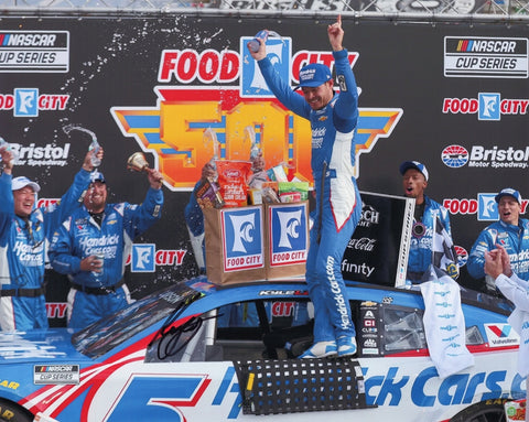 Autographed 8x10 photo of Kyle Larson celebrating his 2025 Bristol Race Win in Victory Lane with his full Hendrick Motorsports team. A vibrant collectible that makes a great gift for NASCAR fans, and we are always here to help with any questions.