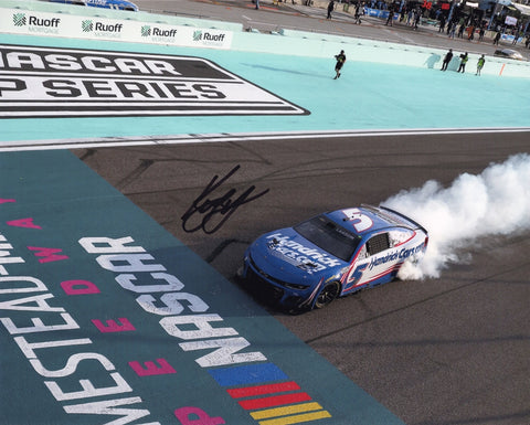 Autographed 8x10 photo of Kyle Larson performing a smoky burnout after winning the 2025 Homestead-Miami race in the #5 Hendrick Racing Chevrolet. The image captures the excitement of the moment and makes a great gift for NASCAR fans, and we are always here to help with any questions.