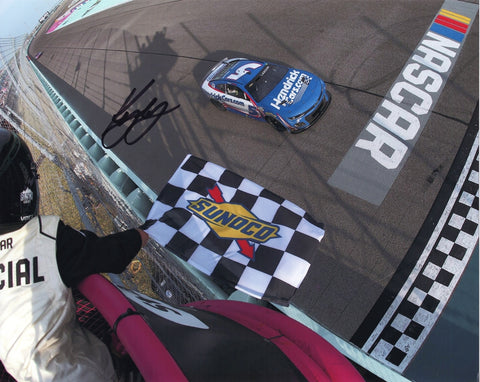 Autographed 8x10 photo of Kyle Larson taking the checkered flag during his 2025 Homestead-Miami victory in the #5 Hendrick Racing Chevrolet. A dynamic piece for collectors and fans, it makes a great gift, and we are always here to help with any questions.