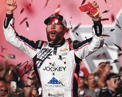 Autographed 8x10 photo of Ross Chastain celebrating his 2025 Coca-Cola 600 win by lifting a watermelon beside the #1 Jockey Chevrolet. A great gift for NASCAR fans and collectors, and we are always here to help with any questions.