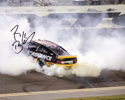 Autographed 2025 Ryan Blaney #12 Advance Auto Daytona night race win burnout photo, showing Blaney’s car smoking the tires under the lights after his dramatic victory. Includes a clear signature and COA, making it a great gift for NASCAR fans. We are always here to help with any questions.