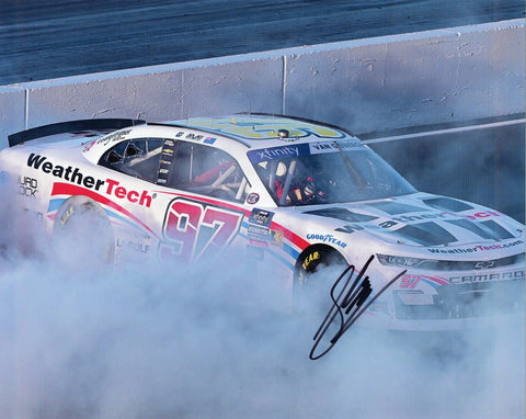 Autographed 2025 Shane Van Gisbergen Sonoma Xfinity Race Win burnout photo showing the #97 WeatherTech Racing car surrounded by smoke as SVG celebrates his victory. This signed 8x10 NASCAR collectible includes a COA, makes a great gift, and we are always here to help with any questions.