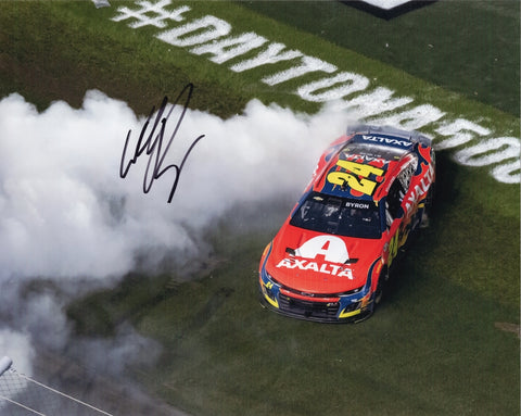 Autographed 2025 William Byron Daytona 500 victory burnout photo showing the #24 Axalta car surrounded by smoke as Byron celebrates his historic win. This signed 8x10 NASCAR collectible includes a COA, makes a great gift, and we are always here to help with any questions you may have.