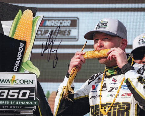 Autographed 2025 William Byron Iowa Race Win Victory Lane corn trophy photo showing Byron smiling while holding the Iowa corn after his victory, with the #24 Raptor Racing car nearby. This signed 8x10 NASCAR collectible includes a COA, makes a great gift, and we are always here to help with any questions.