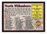 Close-up of signed Dale Earnhardt Sr 1992 Maxx trading card commemorating his 1991 North Wilkesboro victory, showcasing classic card styling, bold colors, and racing history, perfect for NASCAR collectors looking for a unique vintage piece to add to a display or gift to a fan.