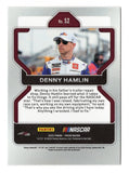 Close-up image of signed Denny Hamlin 2022 Panini Prizm NASCAR trading card highlighting the #11 FedEx Joe Gibbs Racing team car, featuring sharp detail, reflective finish, and racing imagery, perfect for fans and collectors looking to add a high-quality motorsports collectible to their display or give as a great gift.