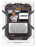 Signed Denny Hamlin 2023 Panini Prizm Racing trading card featuring the iconic No. 11 FedEx design, authentic autograph, included Certificate of Authenticity, and rigid plastic toploader. A premium NASCAR collectible perfect for display or expanding any racing memorabilia collection.