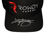 Close-up of the signed Kyle Busch #18 Rowdy Energy black NASCAR racing hat showcasing the authentic autograph, distinctive Rowdy Energy branding, No. 18 styling, and clean black design. Includes a Certificate of Authenticity for an impressive display piece celebrating the two-time NASCAR Cup Series Champion.