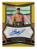 Brilliant gold Prizm styling distinguishes this Brad Keselowski 2025 Panini Select Racing Gold Prizm Autograph NASCAR trading card. Featuring Keselowski's autograph and serial number #01/10, this limited parallel represents the first numbered copy in a run of just ten cards honoring the NASCAR Cup Series champion.