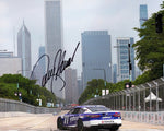 Capture the adrenaline-fueled action of Denny Hamlin at the 2023 Yahoo Racing CHICAGO STREET RACE with this AUTOGRAPHED 8x10 Inch NASCAR Photo, exclusively from Trackside Signatures. Hamlin's exceptional skills shine as he conquers the challenging urban circuit. Rest assured, Trackside Signatures ensures authenticity, with signatures obtained through exclusive public/private signings and privileged garage access via HOT Passes.