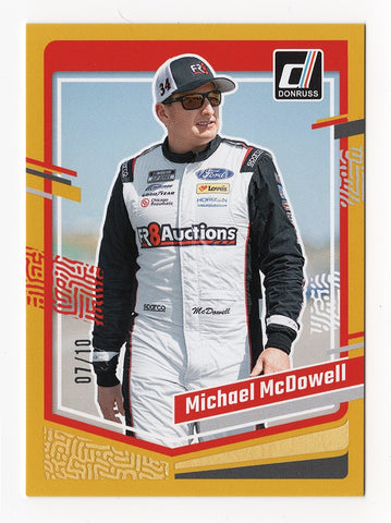 Michael McDowell 2024 Donruss Racing Rare Gold Insert card, numbered #07/10. This exclusive NASCAR collectible showcases McDowell's success in a premium gold finish. With only 10 made, it is a rare addition to any collection, guaranteed authentic for life and perfect for gifting to NASCAR fans.