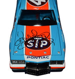 Signed Lionel NASCAR Classics Richard Petty 200th Win diecast highlighting the bold STP colors, vintage decals, and replica wear from the Daytona victory. This rare piece honors one of the biggest milestones in racing and makes a great gift. We are always here to help with any questions.
