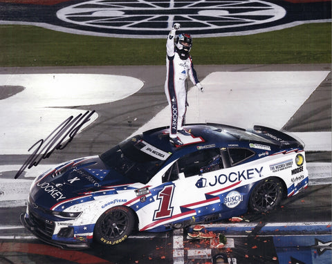 Autographed 2025 Ross Chastain #1 Jockey Patriotic Coca-Cola 600 win photo showing Chastain celebrating with his famous watermelon smash in Victory Lane. The patriotic paint scheme, signature, and COA make it a standout collectible for NASCAR fans, and it also makes a great gift for racing enthusiasts.