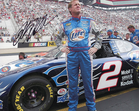 Celebrate Rusty Wallace’s unforgettable farewell moment with this autographed 8x10 glossy photo. Featuring Wallace in the "Rusty’s Last Call" pit road pose, this collectible comes with a COA, ensuring the authenticity of the signature, making it an ideal gift for NASCAR fans.