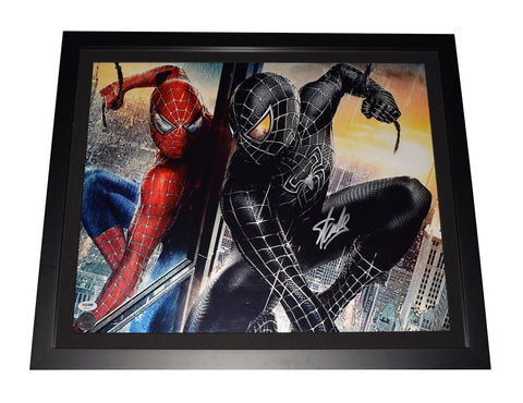 Stan Lee Autographed Spider-Man Good vs. Evil Photo" - This rare 16X20 inch metallic photo, personally autographed by Stan Lee, is a prized Marvel collectible. Professionally framed at 18X22 inches, it features the Official Stan Lee Excelsior Approved hologram and PSA sticker for authenticity assurance. A must-have for any Marvel enthusiast.
