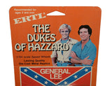 Close-up view of the rare Ertl General Lee 1/64 scale diecast from The Dukes of Hazzard. The collectible car showcases detailed orange bodywork, signature roof graphics, black window accents, numbered doors, and the distinctive design recognized by generations of television fans.