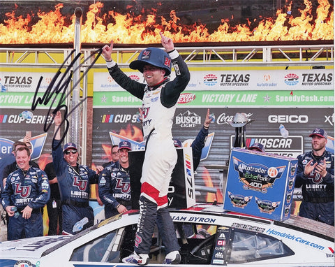 Immerse yourself in the thrill of victory with this exclusive collectible - an autographed 2023 William Byron #24 Liberty TEXAS RACE WIN NASCAR photo, capturing the fiery celebration of Victory Lane Fire. Each signature is meticulously obtained through sought-after public/private signings and garage area access via HOT Passes, ensuring unparalleled authenticity. 