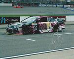 AUTOGRAPHED 2015 Dale Earnhardt Jr. #88 AMP Energy Passion Fruit MICHIGAN INTERNATIONAL SPEEDWAY (Pit Road) Hendrick Motorsports Signed NASCAR Picture 8X10 Inch Glossy Photo with COA